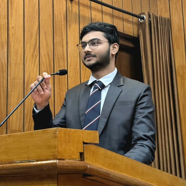 Madhav Sonkusare speaking at a lectern