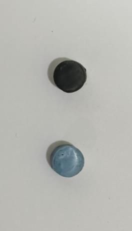 Two cast specimen pins, one plain rPET and one graphene grade